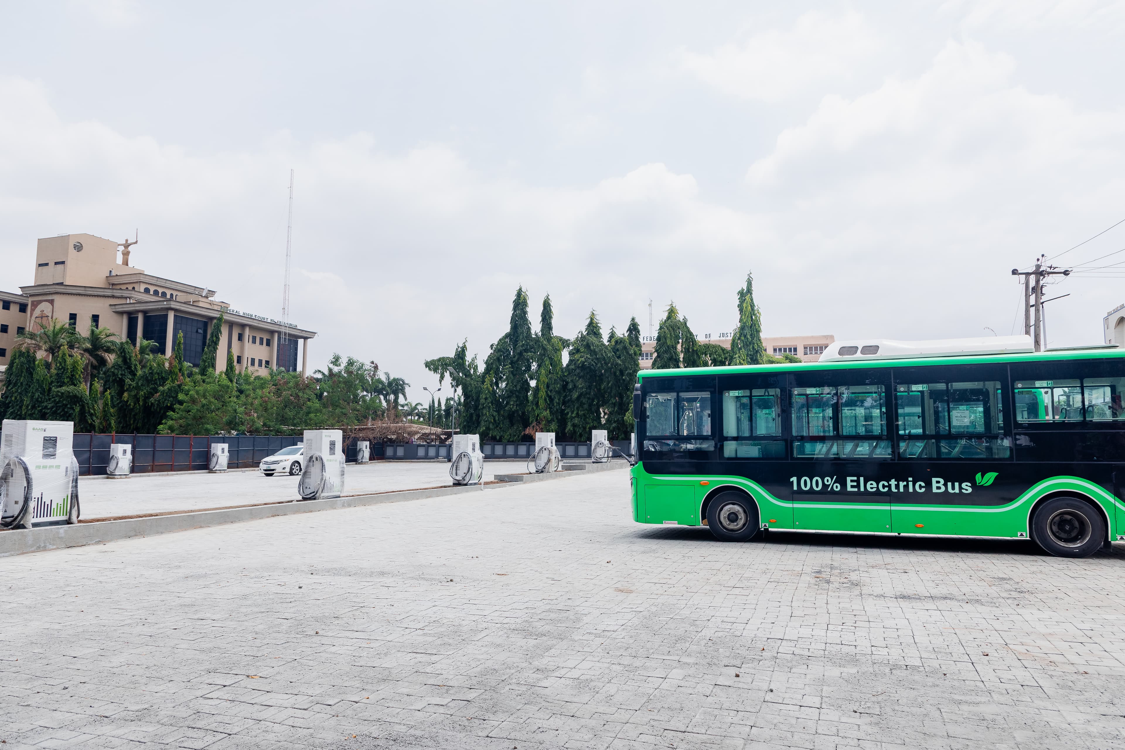 Electric bus plugged into DC fast charger at Possible EVS depot